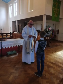  Thomas receiving his youth Bible 