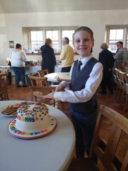  Thomas about to cut the cake. 